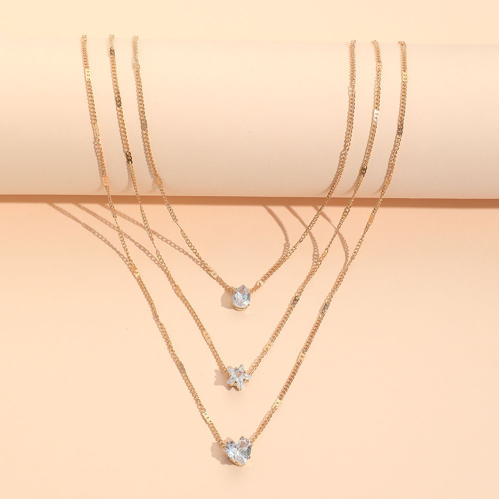 Multi-Layer Zircon Star & Heart Pendant Necklace – Elegant Layered Jewelry