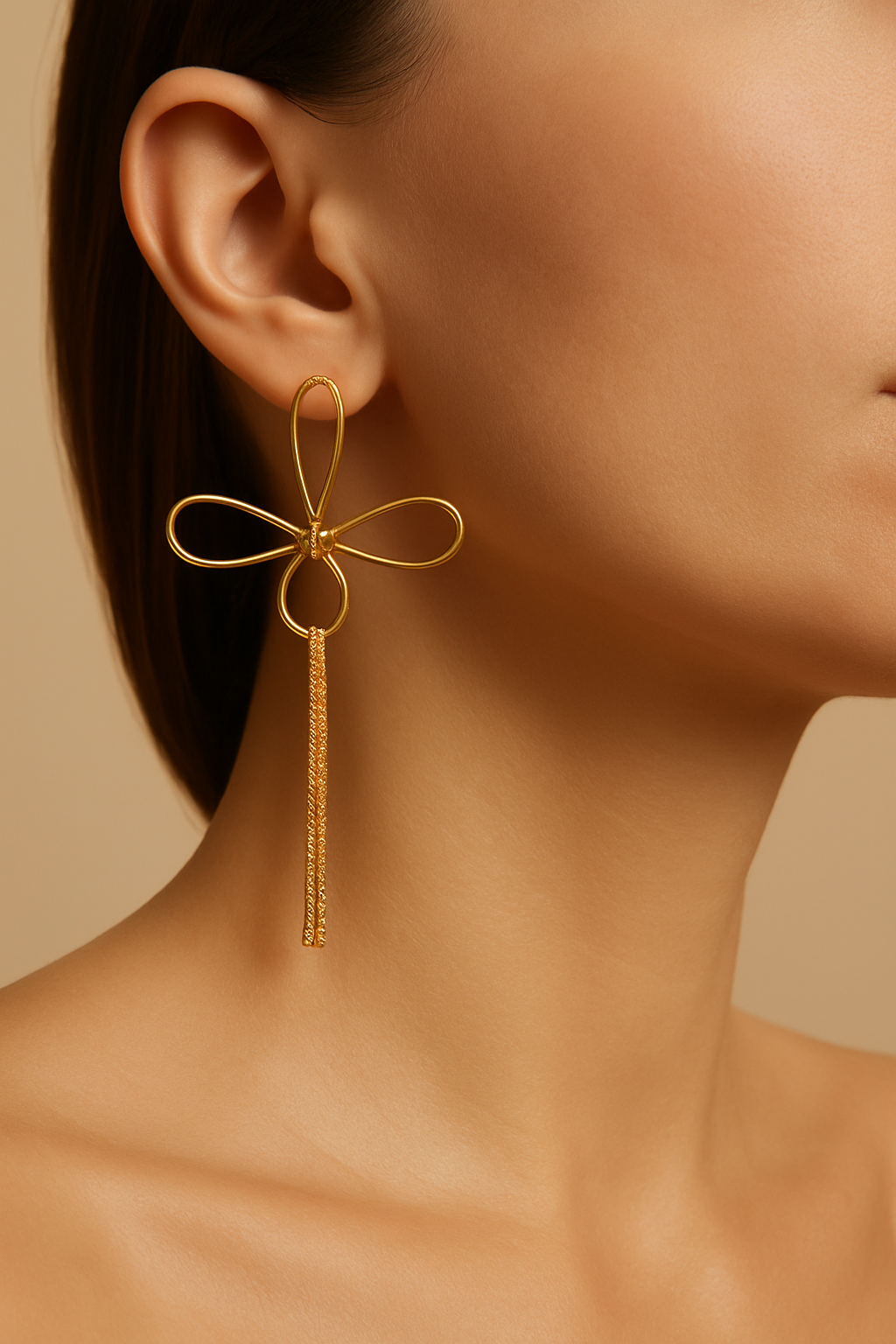 Gold Bow Tassel Earrings - on model